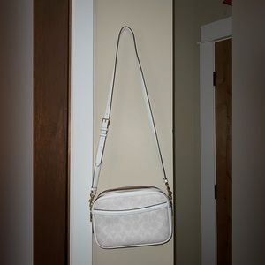 Super cute white coach crossbody purse!